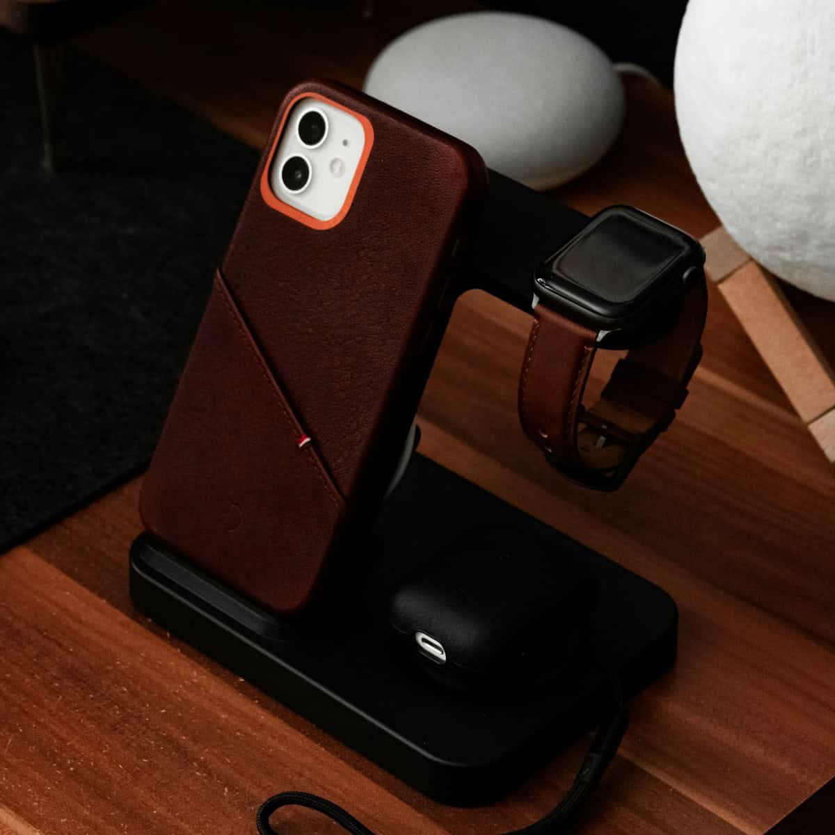 a cell phone sitting on top of a wooden table