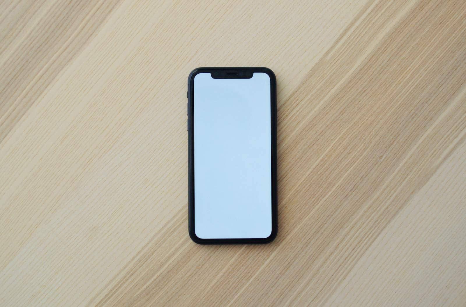 iPhone with White Screen on Table