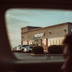 cars parked in front of store during daytime