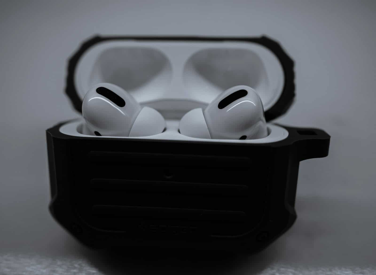 white apple earpods in black case