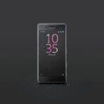 black Sony Android smartphone with water drops