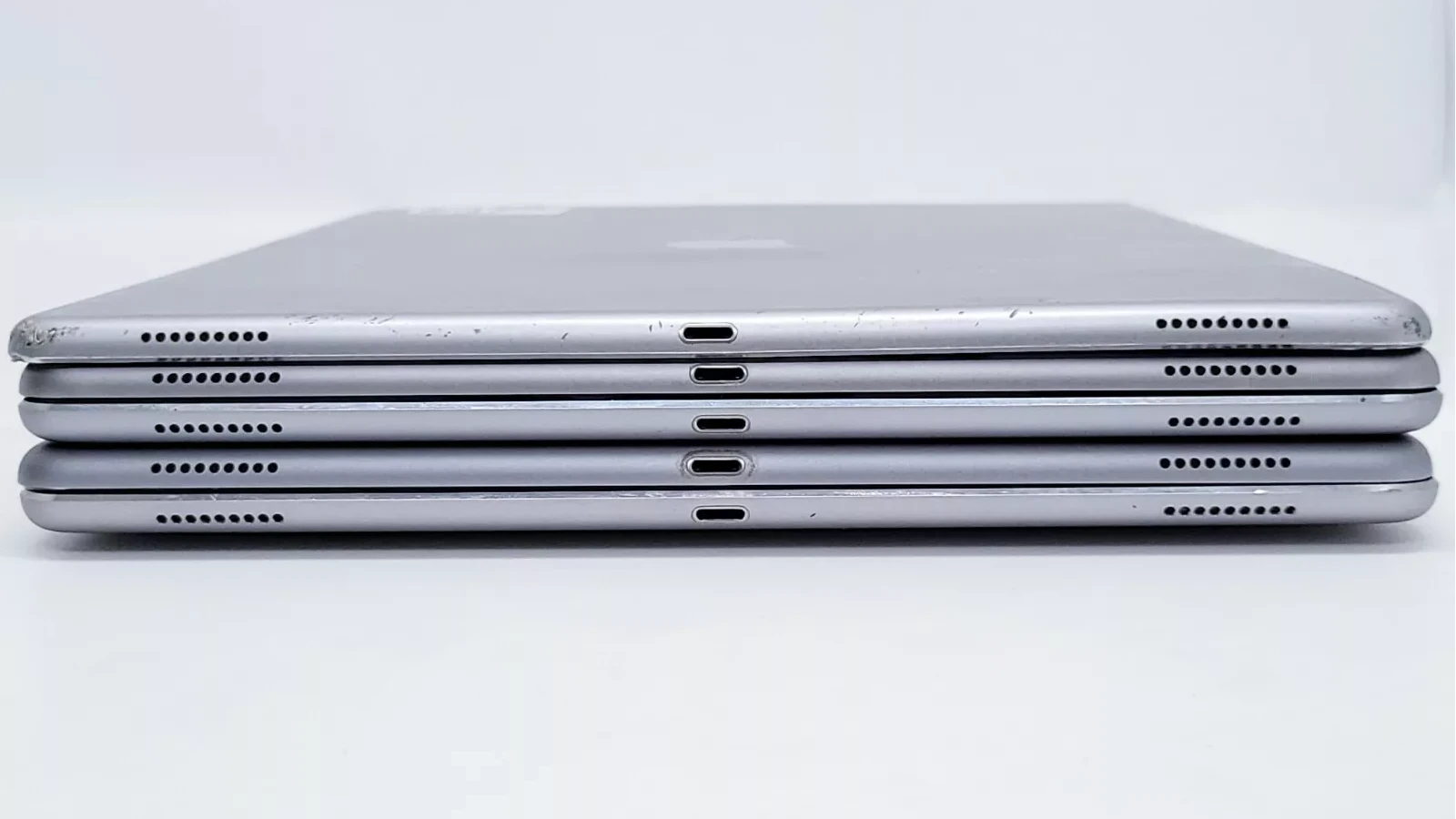 Stack of iPads With Bad Charging Ports
