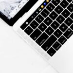 closeup photo of white and black laptop computer