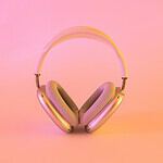 pink and white wireless headphones